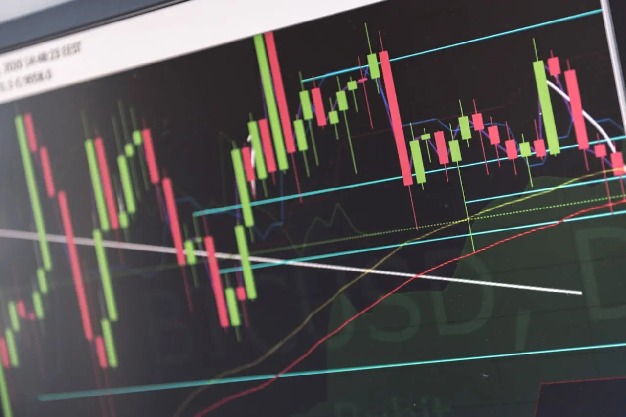 gallery-2 Close-up of vibrant stock market graphs displaying trading trends on a monitor, ideal for finance and cryptocurrency concepts.